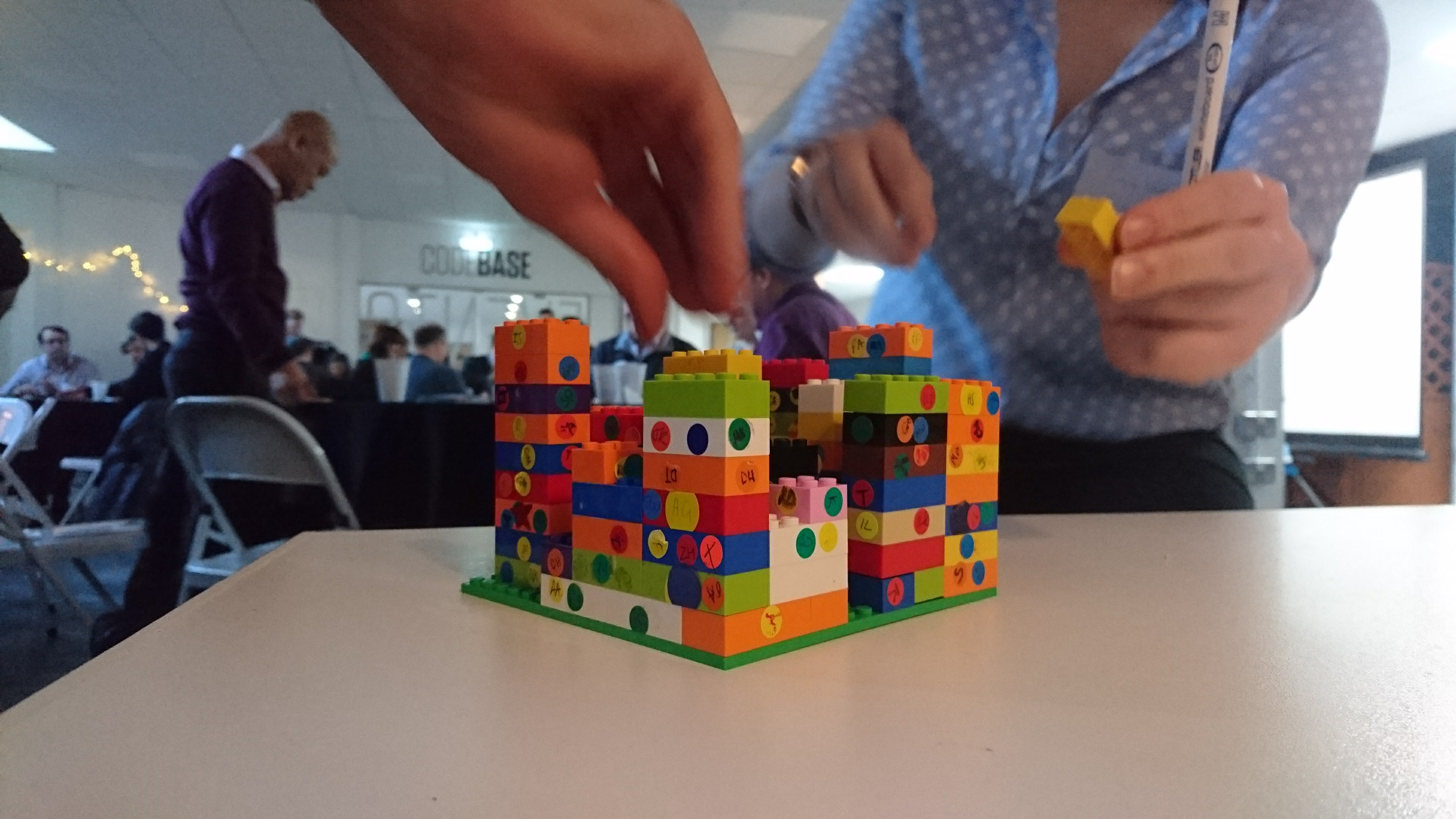 Participants building the Lego ledger during BlockExchange workshop